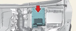 Professional inspection of the 12-volt battery in a Kia Carnival engine bay