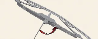 Rotating the Kia Carnival wiper blade to expose the locking clip