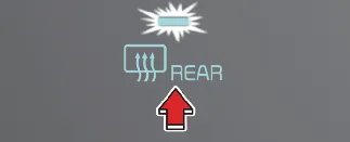 Rear window defroster activation button in Kia Carnival