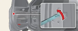 Using the mechanical key to manually lock the Kia Carnival door in an emergency