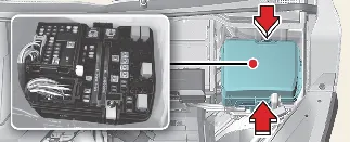 Opening the engine compartment fuse box cover on the Kia Carnival