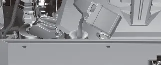 Using a clean funnel to add engine oil to the Kia Carnival