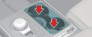 Ergonomic front seat cup holders in Kia Carnival center console