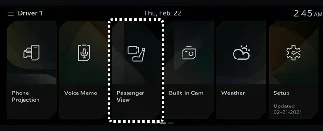Infotainment display showing the Passenger View camera feed in Kia Carnival