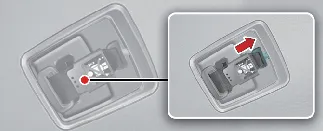 Final stowage of the Kia Carnival center seat belt assembly
