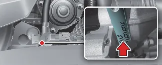 Diagram showing the stamped engine number location on Kia Carnival