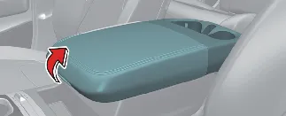 Accessing the deep center console storage in the Kia Carnival