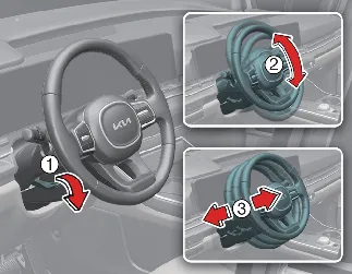 Interior view showing the steering wheel lock release lever in the Kia Carnival