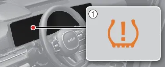 Kia Carnival instrument cluster displaying the TPMS warning indicator